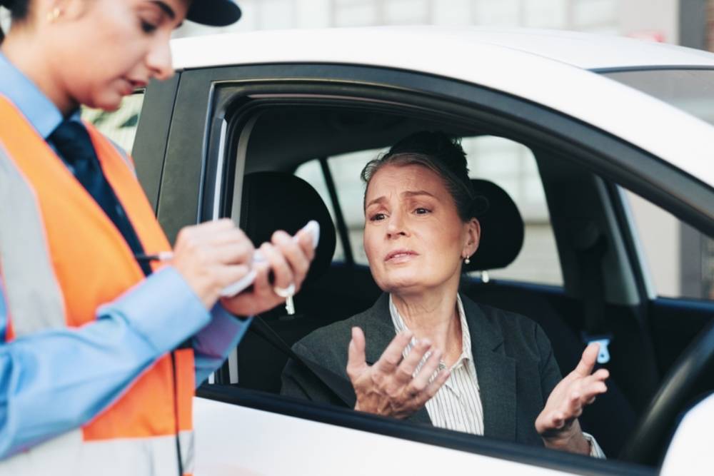 Woman, police and writing fine for car speeding, ticket warning and law violation of crime